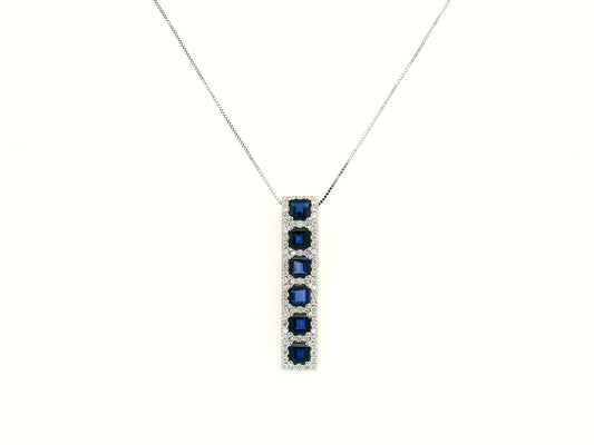18K Yellow Gold Sapphire and Diamond Pendant featuring 1.45 carats of square-cut sapphires and a 0.34-carat diamond halo in a sleek vertical design.