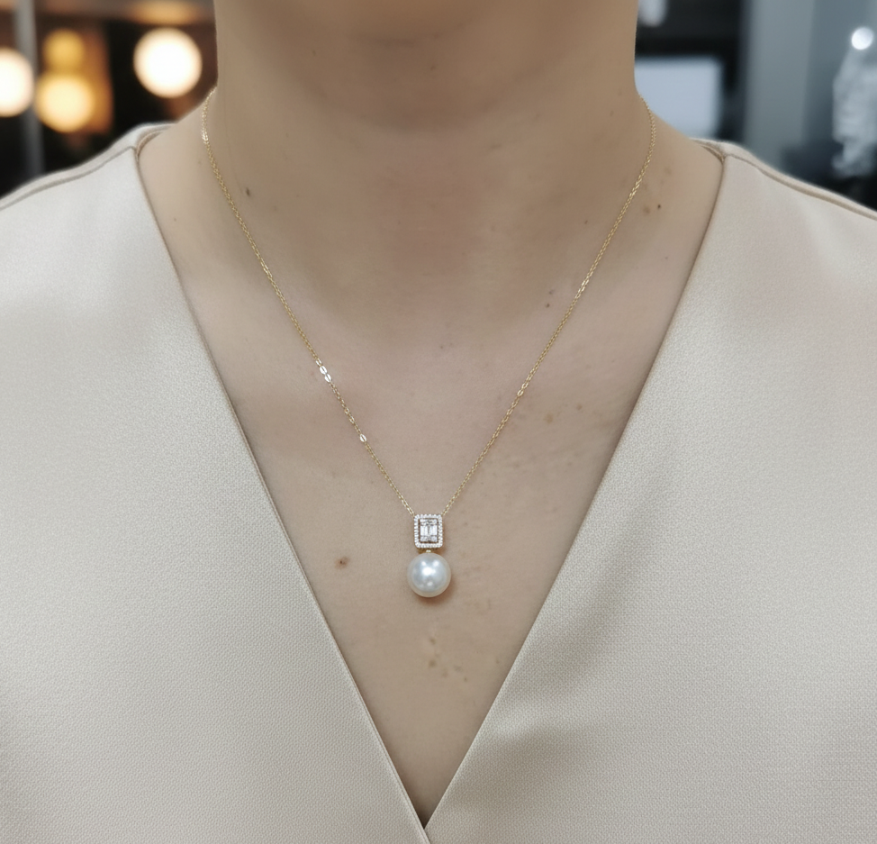 18K yellow gold South Sea pearl necklace with diamond accents by Emirates Diamonds