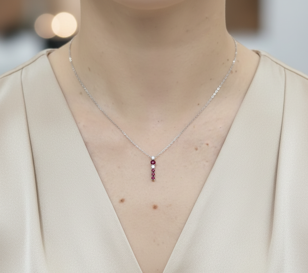 18K white gold ruby and diamond vertical pendant necklace by Emirates Diamonds