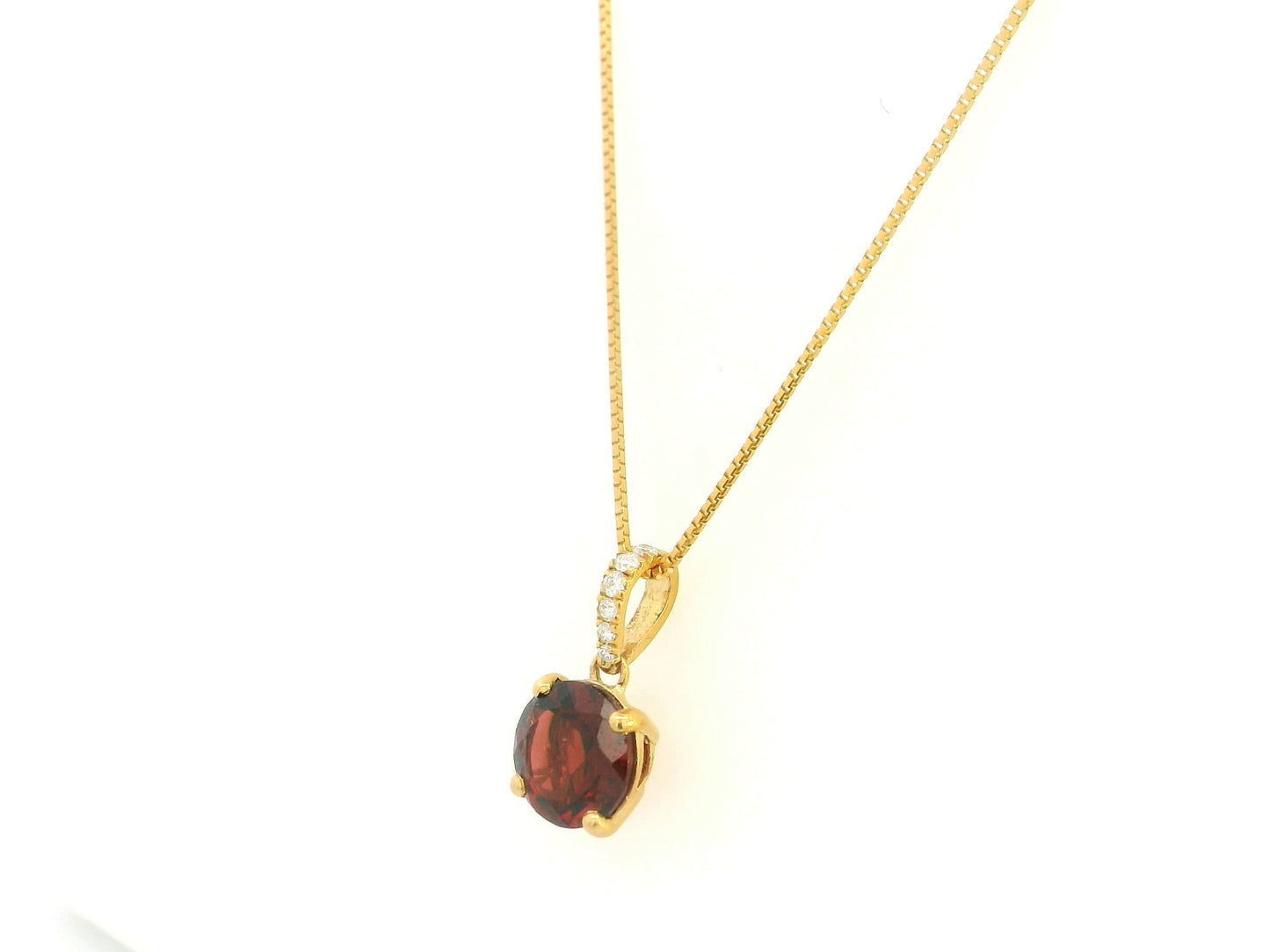 Round garnet and diamond pendant 2.03ct set in 18K yellow gold by Emirates Diamonds