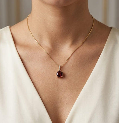 Round garnet and diamond pendant 2.03ct set in 18K yellow gold by Emirates Diamonds