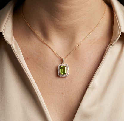 Natural 1.52 carat emerald cut peridot pendant in solid 18K yellow gold with a 0.40 carat natural diamond halo, elegant August birthstone necklace, chain sold separately.