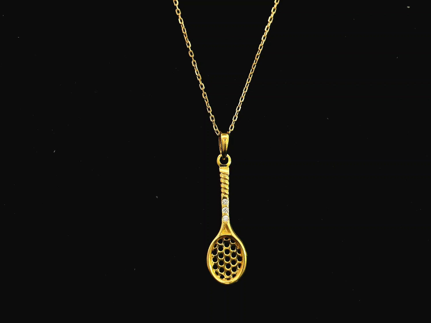 18K yellow gold tennis racket pendant necklace with diamond accents by Emirates Diamonds
