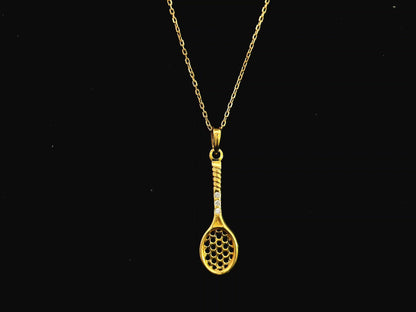18K yellow gold tennis racket pendant necklace with diamond accents by Emirates Diamonds