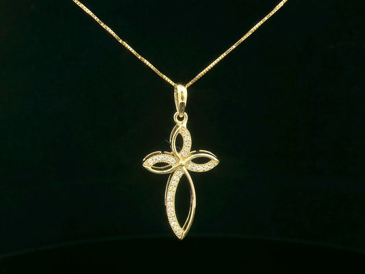 Elegant 18K gold cross pendant with pavé-set diamonds, featuring marquise-shaped curves and 0.10 carat diamond accents.