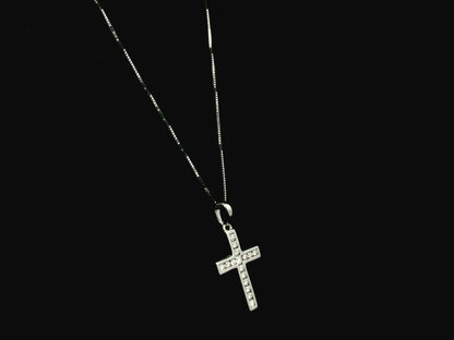 18K white gold diamond cross pendant featuring 0.20 carat natural diamonds in a timeless cross design.