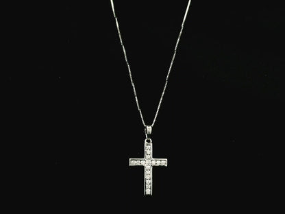 18K white gold diamond cross pendant featuring 0.20 carat natural diamonds in a timeless cross design.