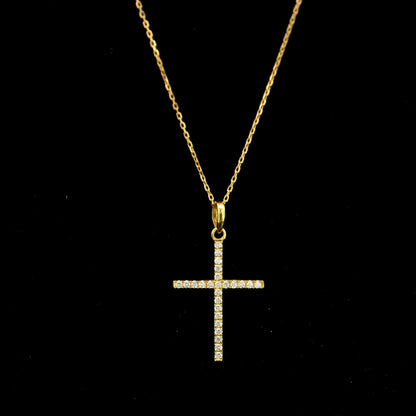 18K yellow gold diamond cross pendant featuring 0.26 carat natural round brilliant diamonds. Chain sold separately.