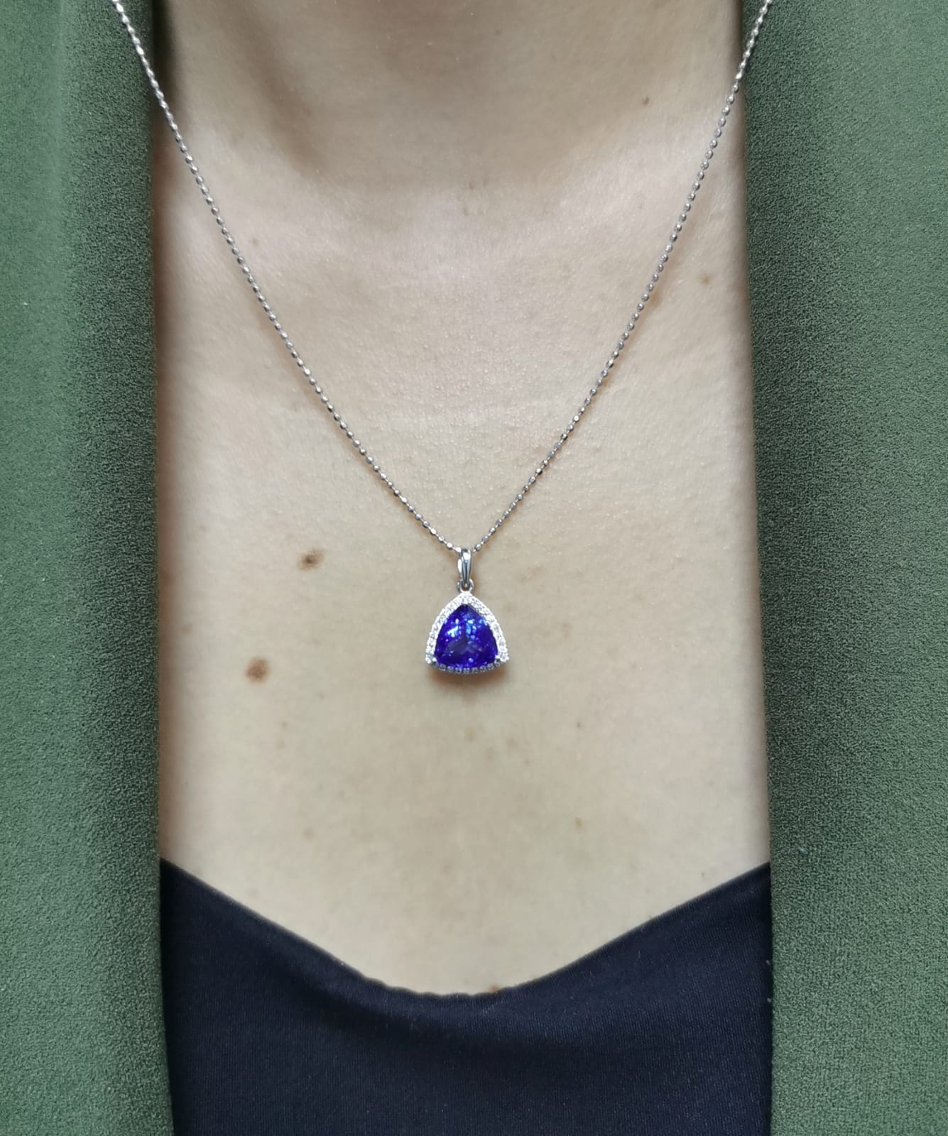 Trillion-cut Tanzanite pendant in 18K white gold with diamond halo, 3.43 carat Tanzanite and 0.16 carat diamonds