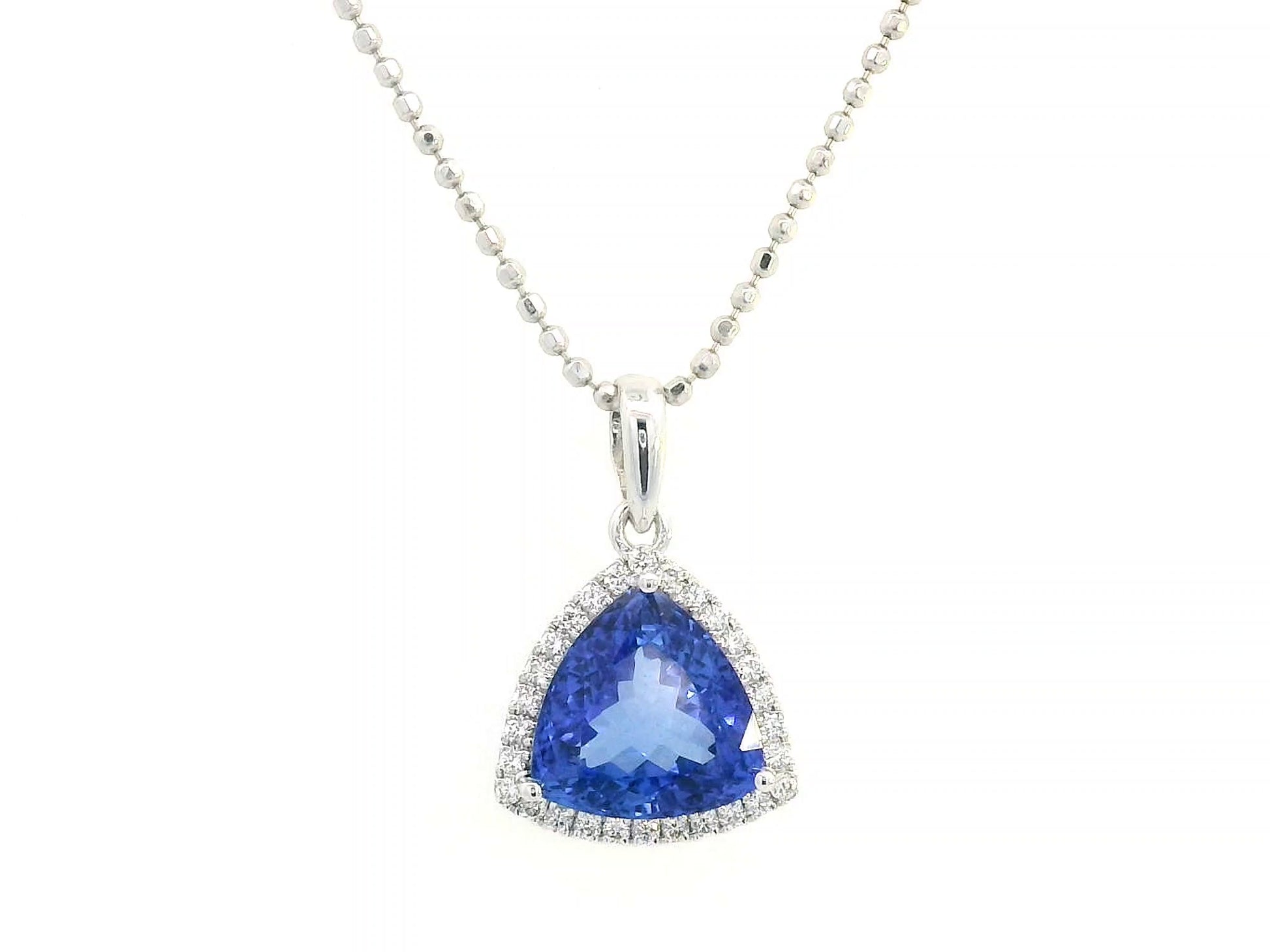 Trillion-cut Tanzanite pendant in 18K white gold with diamond halo, 3.43 carat Tanzanite and 0.16 carat diamonds