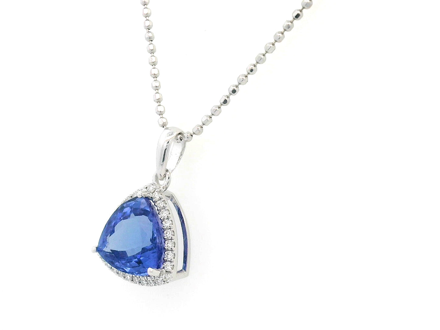 Trillion-cut Tanzanite pendant in 18K white gold with diamond halo, 3.43 carat Tanzanite and 0.16 carat diamonds