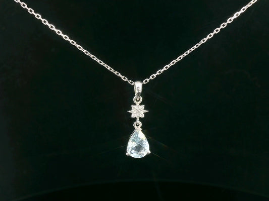 Aquamarine and diamond drop pendant in 18K white gold featuring 0.87 carat aquamarine and 0.06 carat diamonds