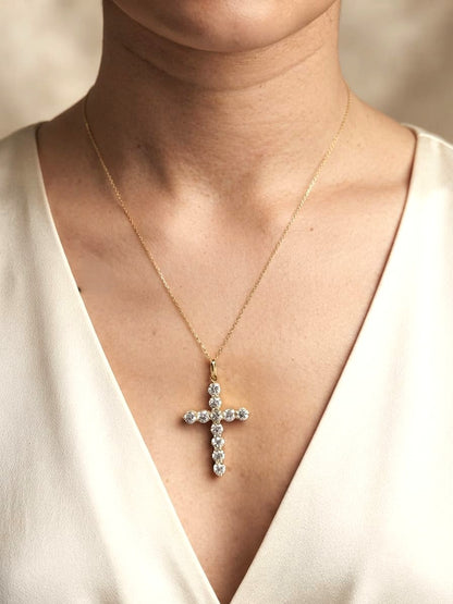 18K yellow gold natural diamond cross pendant featuring 2.21 carats of round brilliant diamonds.