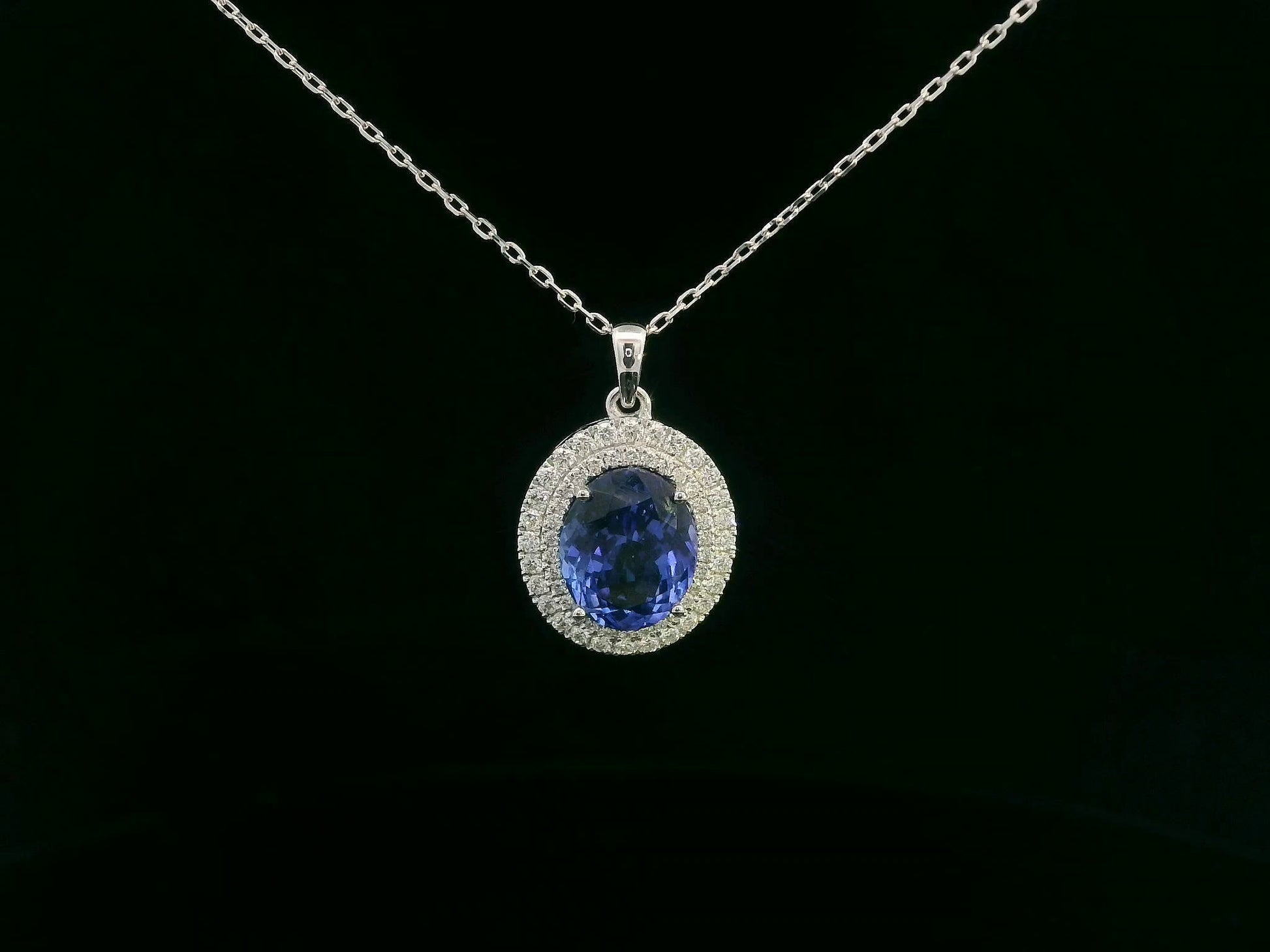 18K white gold double halo Tanzanite pendant