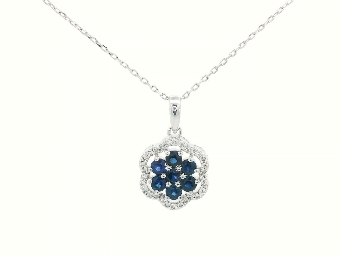 18K white gold floral pendant with sapphires and diamond halo