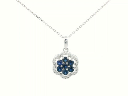 18K white gold floral pendant with sapphires and diamond halo