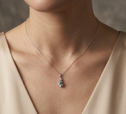 Aquamarine and Diamond Pendant in 18K White Gold. Pear Shaped Aquamarine