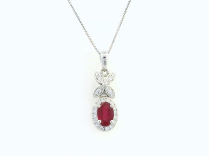 18k white gold pendant with 0.63-carat oval ruby, diamond halo, and floral diamond-accented bail