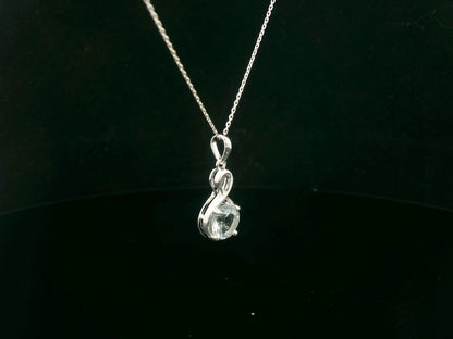 18k white gold pendant with 1.10-carat round-cut aquamarine in infinity-style bail design