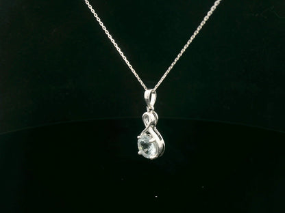 18k white gold pendant with 1.10-carat round-cut aquamarine in infinity-style bail design