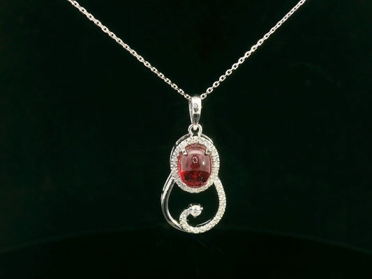 18k white gold swirl pendant with 1.99ct cabochon ruby & 0.21ct diamonds – certificate included