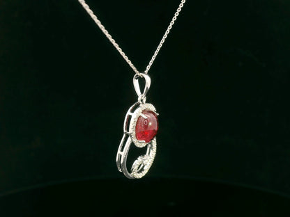 18k white gold swirl pendant with 1.99ct cabochon ruby & 0.21ct diamonds – certificate included
