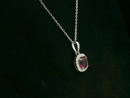 18k white gold pendant with 1.08ct cushion-cut rhodolite & 0.10ct diamond halo – certified authenticity included