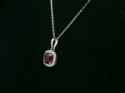 18k white gold pendant with 1.08ct cushion-cut rhodolite & 0.10ct diamond halo – certified authenticity included