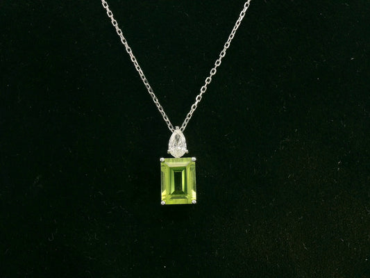 18k white gold pendant with 1.81ct emerald-cut peridot & 0.18ct pear diamond – certified authenticity included