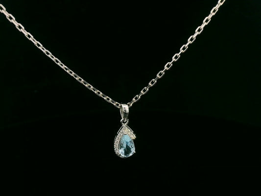 18k white gold pendant with 0.57ct pear aquamarine & 0.08ct diamond halo – certified authenticity included