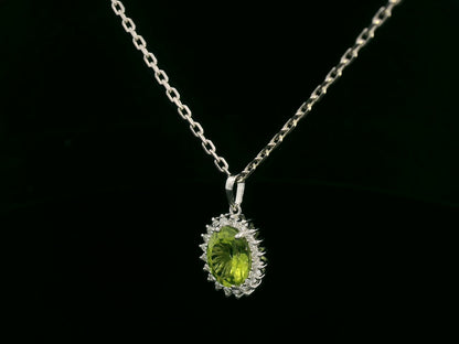 18k white gold pendant with 2.76ct oval peridot & 0.27ct diamond halo – certified authenticity included