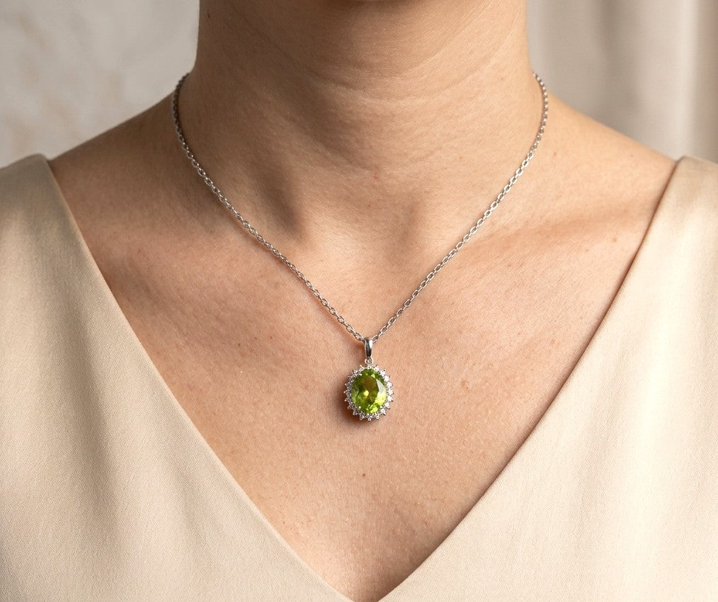 Natural 2.76 carat oval peridot pendant in solid 18K white gold with a 0.27 carat natural diamond halo, elegant August birthstone pendant, chain sold separately.