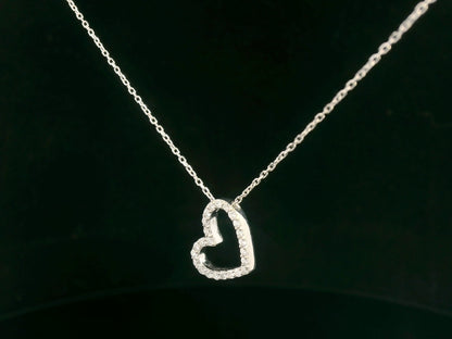 18K white gold diamond open heart necklace, pavé-set pendant, dainty fine jewelry by Emirates Diamonds.