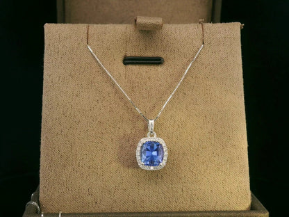 18K white gold Tanzanite and diamond halo pendant with cushion-cut 2.02 carat center stone
