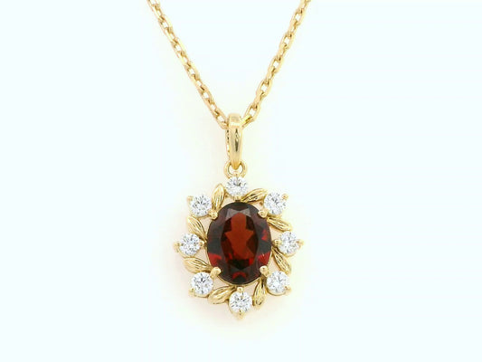 Oval-cut garnet and diamond necklace in 18K yellow gold by Emirates Diamonds