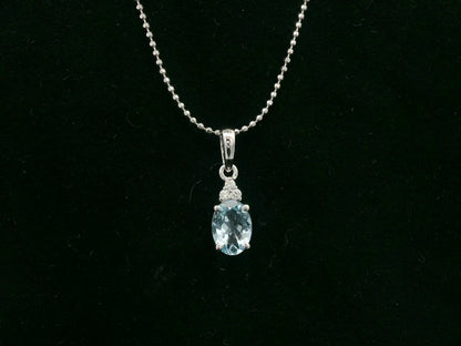 Oval aquamarine and diamond pendant in 18K white gold by Emirates Diamonds