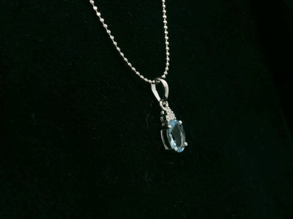 Oval aquamarine and diamond pendant in 18K white gold by Emirates Diamonds