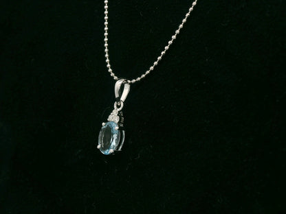 Oval aquamarine and diamond pendant in 18K white gold by Emirates Diamonds