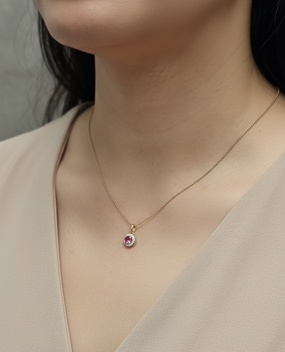 18K yellow gold pink sapphire and diamond halo pendant  – fine jewelry by Emirates Diamonds