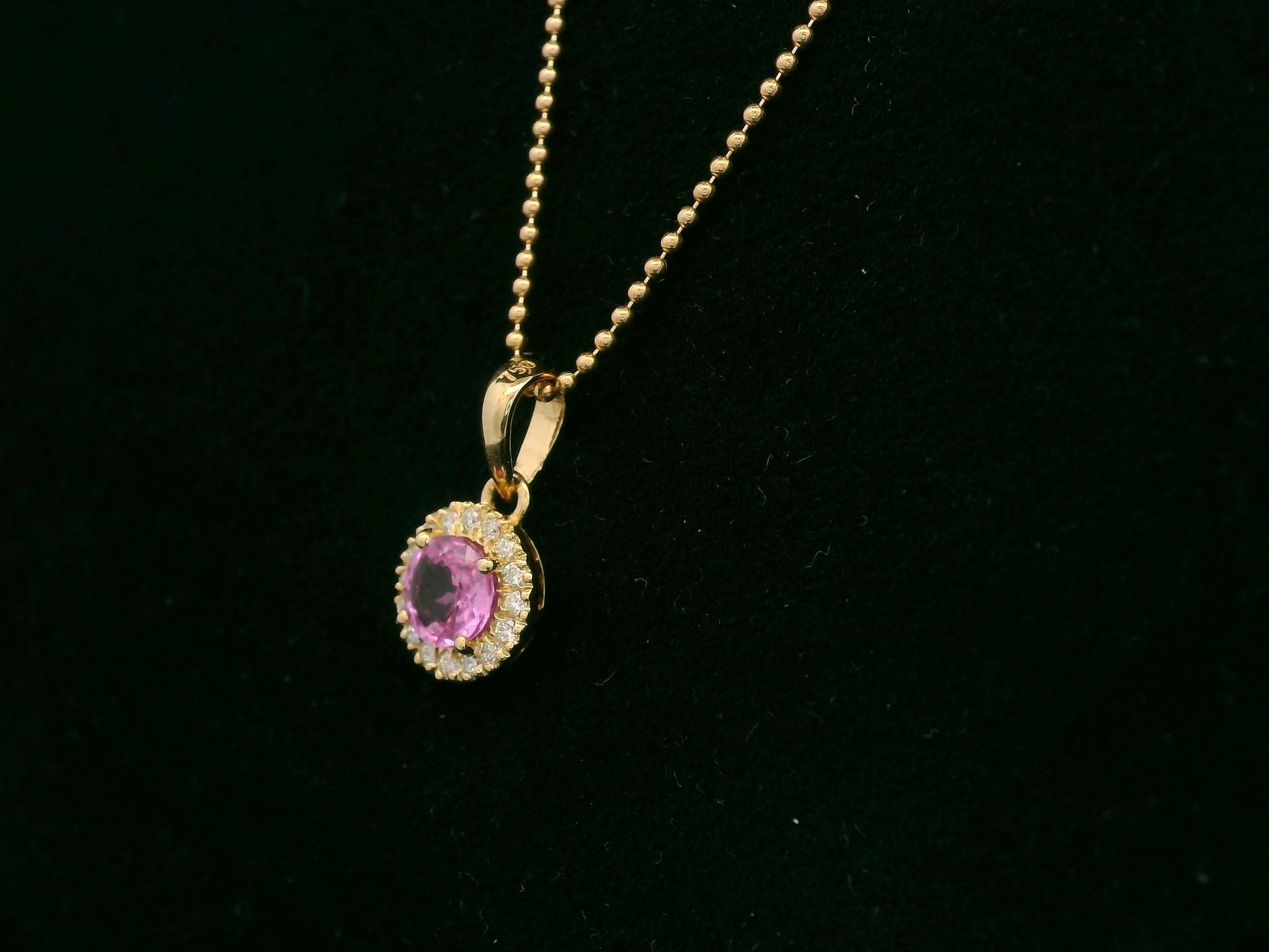 18K yellow gold pink sapphire and diamond halo pendant – fine jewelry by Emirates Diamonds