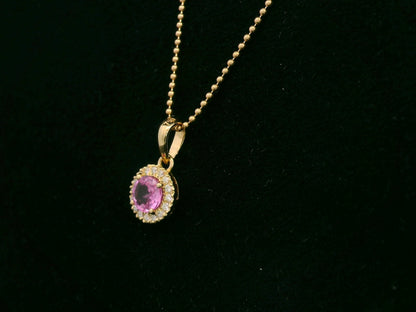 18K yellow gold pink sapphire and diamond halo pendant – fine jewelry by Emirates Diamonds