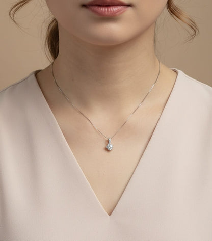 18K white gold diamond pendant with 0.58ct SI1 I-color center stone and 0.09ct accent diamonds – Emirates Diamonds