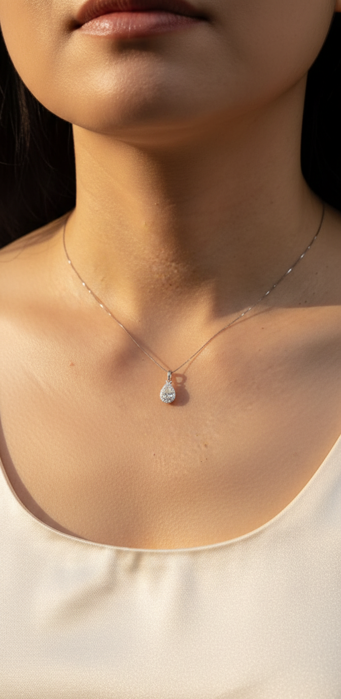 18K white gold pear diamond pendant with 0.51ct D SI1 GIA diamond and 0.14ct halo – Emirates Diamonds