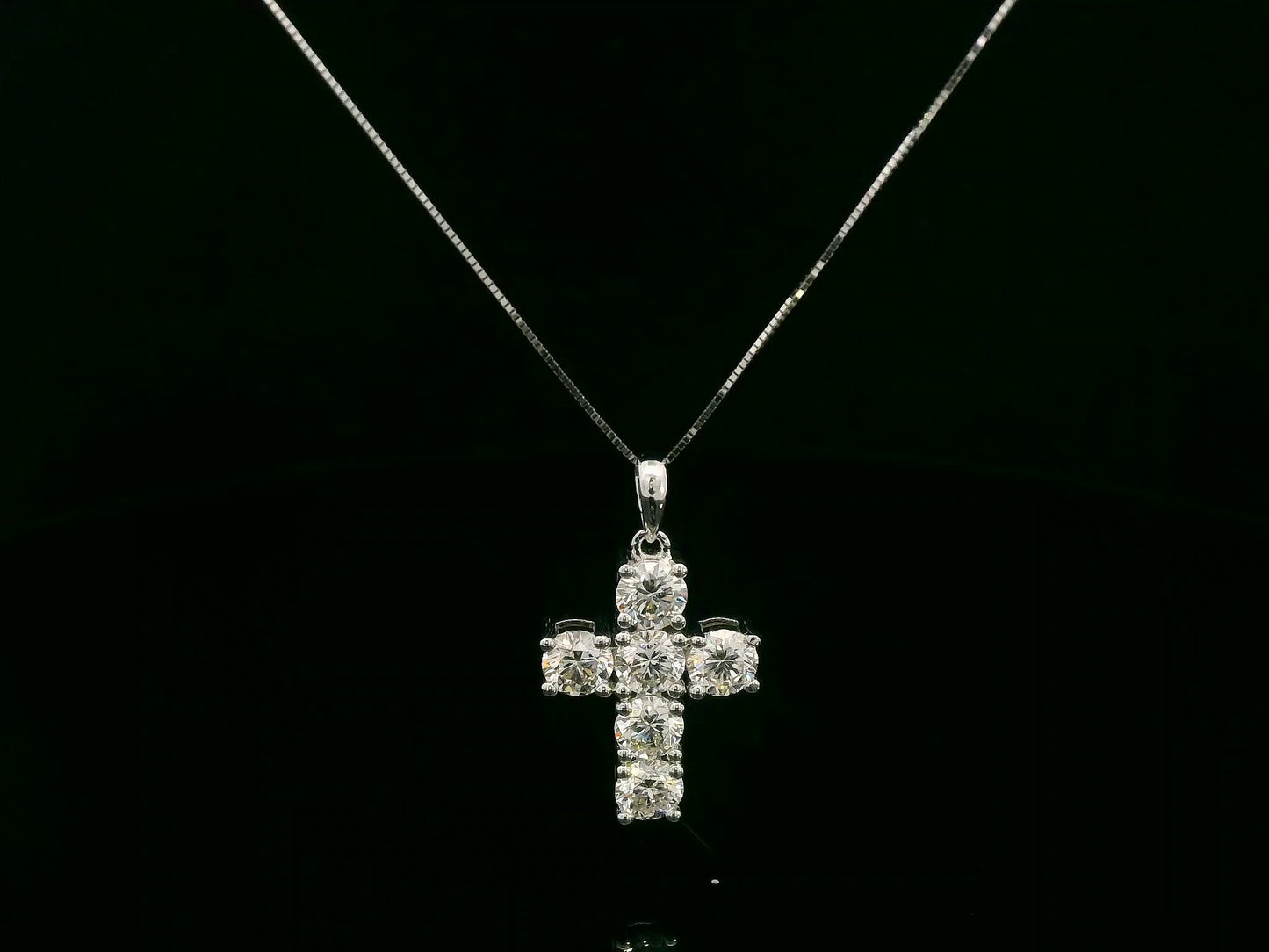 18K white gold diamond cross pendant featuring round-cut natural diamonds totaling 2.20 carats by Emirates Diamonds