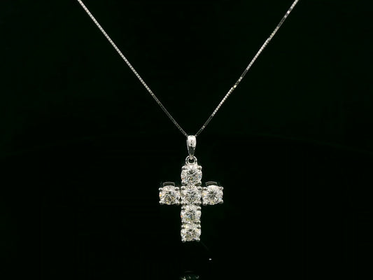 18K white gold diamond cross pendant featuring round-cut natural diamonds totaling 2.20 carats by Emirates Diamonds