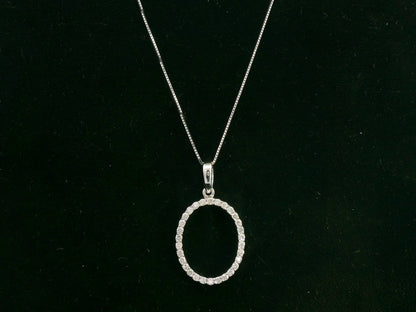 18K white gold oval diamond halo pendant with pavé-set diamonds, 0.25 carat total diamond weight, fine jewelry by Emirates Diamonds