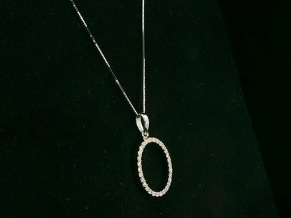 18K white gold oval diamond halo pendant with pavé-set diamonds, 0.25 carat total diamond weight, fine jewelry by Emirates Diamonds