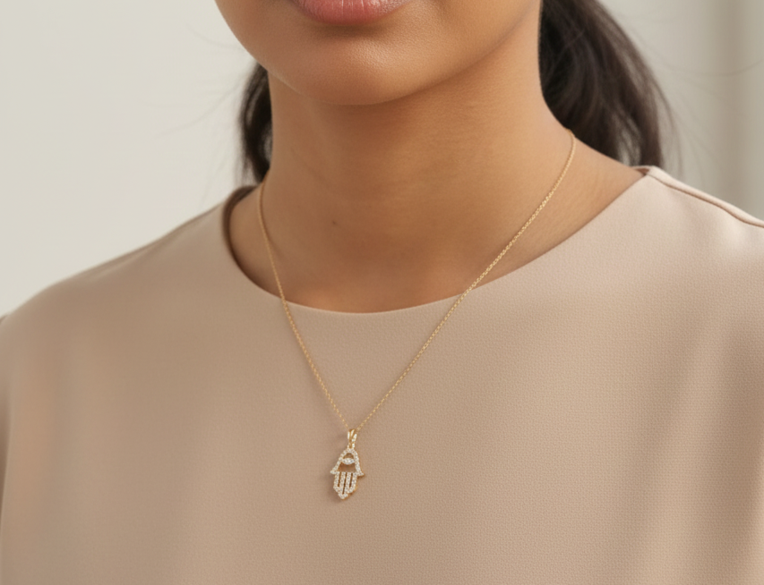 18K yellow gold diamond Hamsa hand pendant  by Emirates Diamonds