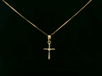 0.02 carat diamond cross pendant in 18K yellow gold minimalist necklace by Emirates Diamonds