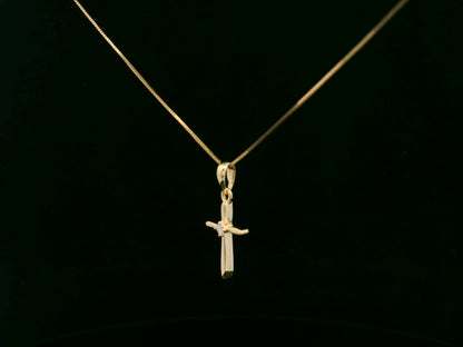 0.02 carat diamond cross pendant in 18K yellow gold minimalist necklace by Emirates Diamonds